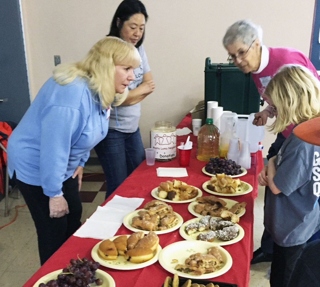 Diane McCleary and Macey Taylor took a shift at the refreshments table.