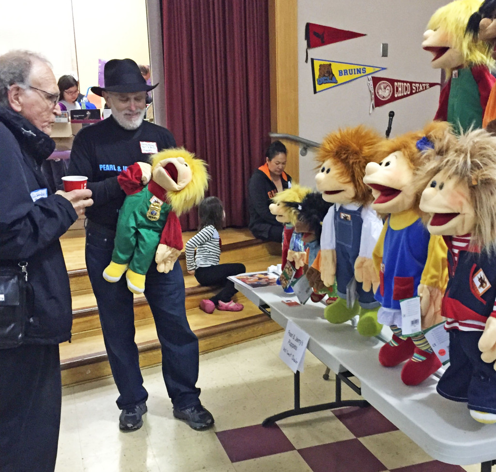 Jerry Kruss demonstrated his puppets to Bob Jahnke.