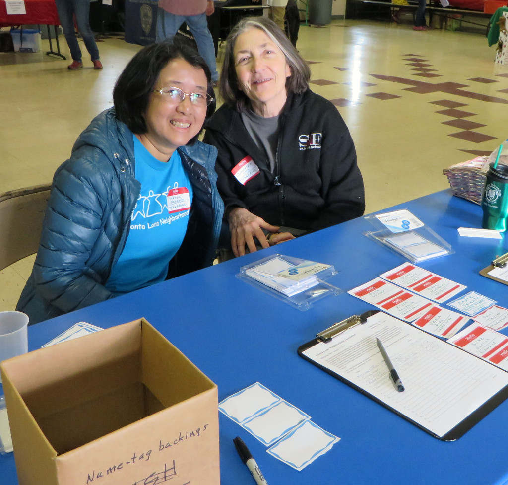 Maria Harnoto & Carolyn Len ready at the welcome table.